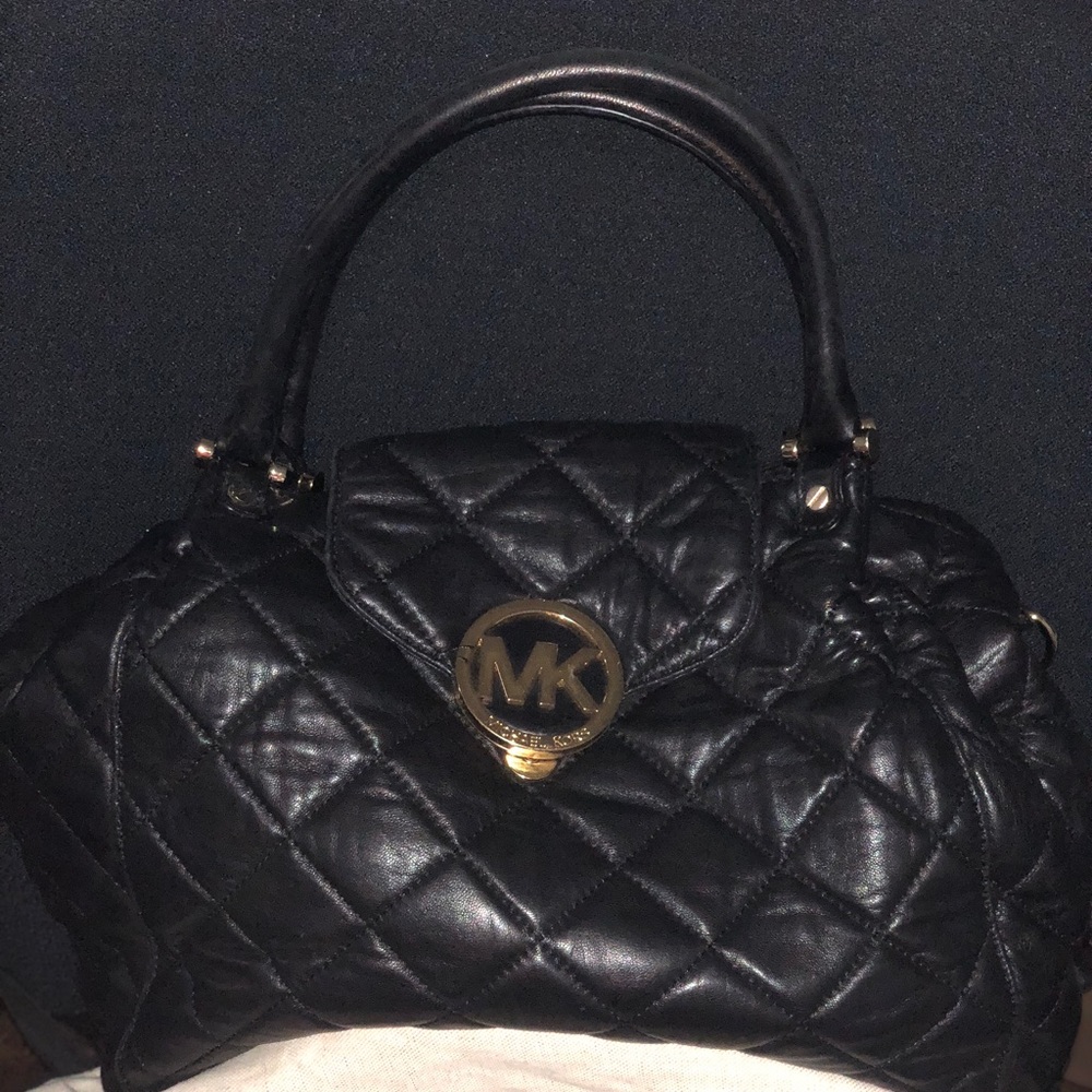 Michael kors handbag   Black and gold